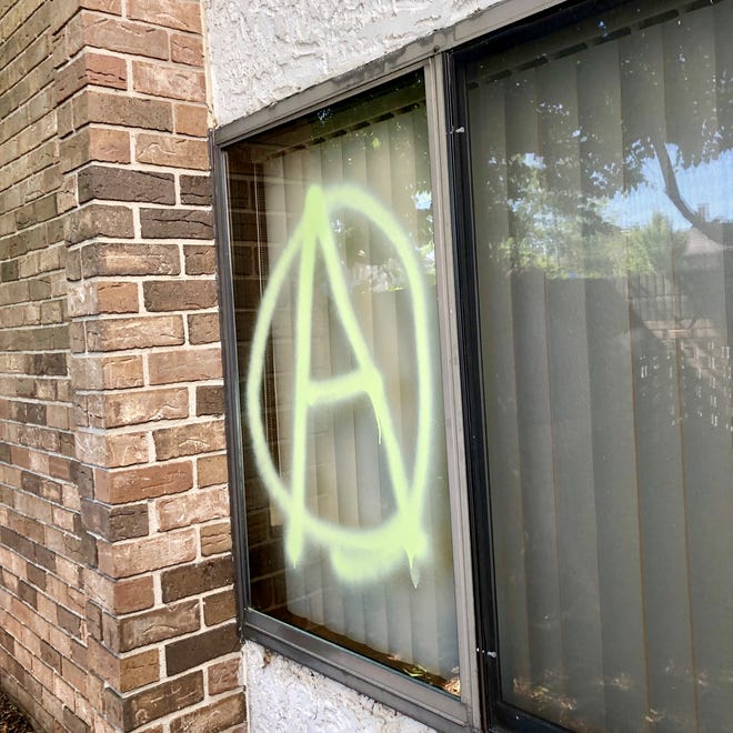 Vandals targeted Michigan Republican Party headquarters a second time late Monday night. Graffiti included the anarchist symbol.