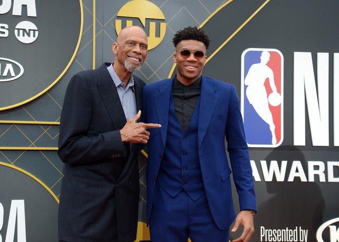 Bucks forward Giannis Antetokounmpo poses with NBA legend Kareem Abdul-Jabbar before the 2019 NBA Awards Show.