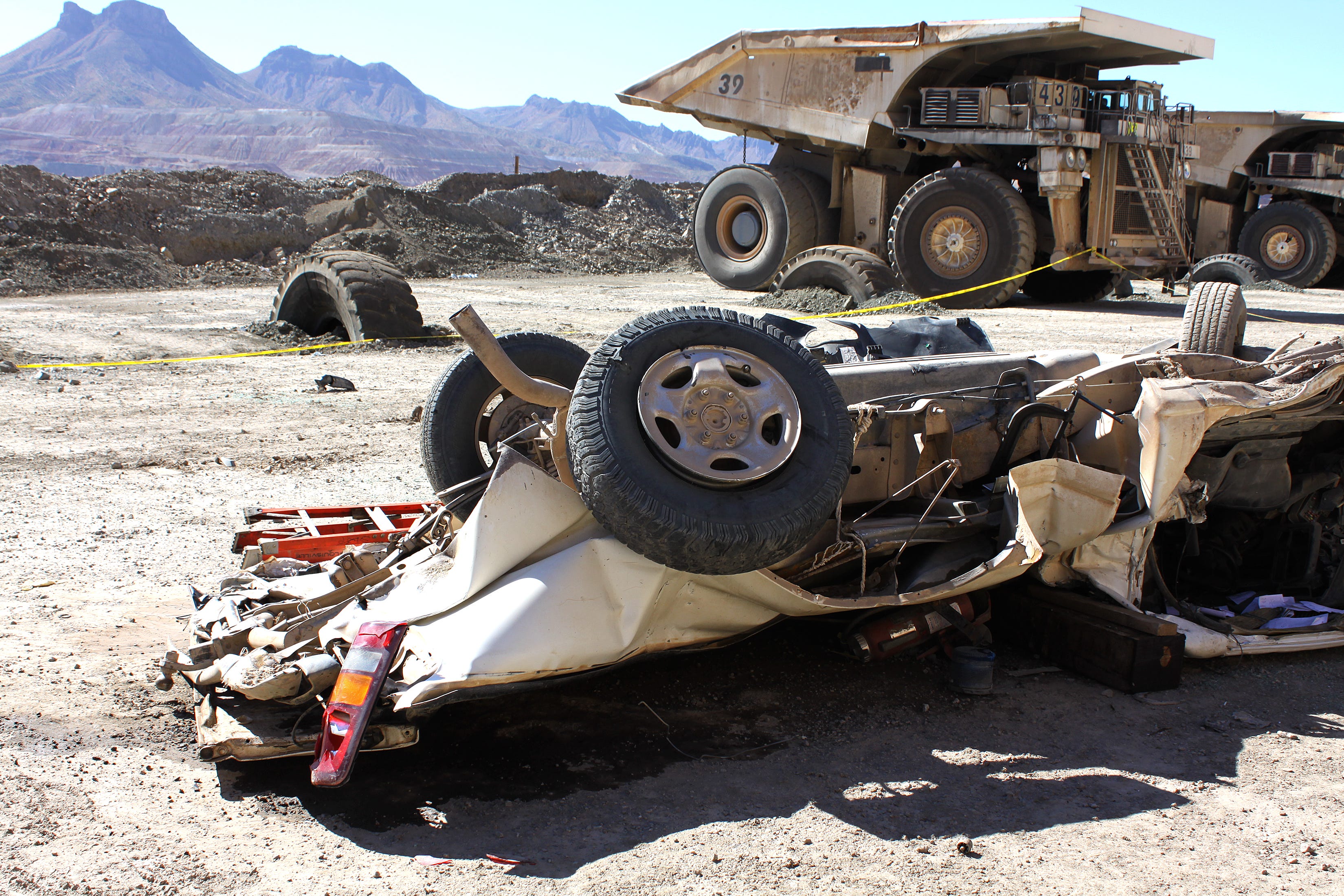 A giant ore-hauling truck crushed mine employee Thomas Benavidez as he sat in this pickup truck with another mine employee, who escaped.