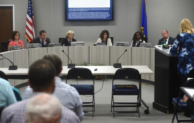 WCSD Board of Trustees President Katy Simon Holland, middle left, and Acting Superintendent Kristen McNeill, middle right, preside over the Washoe County School District board meeting in Reno on June 25, 2019.