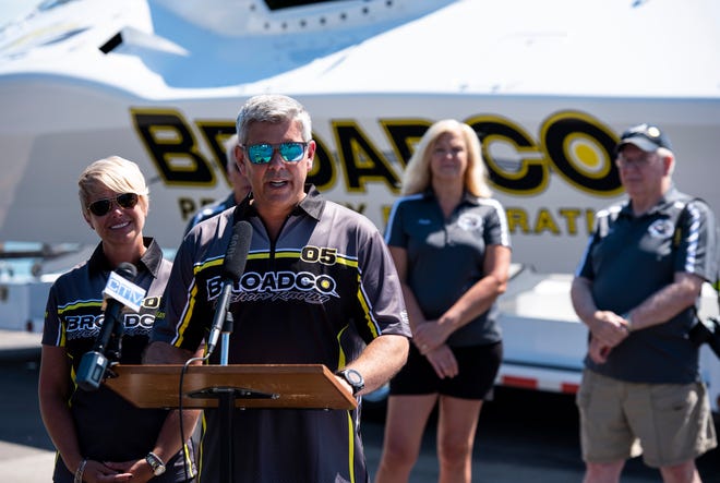 2014 World Champion Chuck Broaddus, right, stands with his wife Kellie in front of the Broadco boat while he delivers remarks during a press conference for the St. Clair River Classic Wednesday, June 26, 2019, at the Voyageur restaurant in St. Clair. It was announced that Jeff Katofsky, developer of the St. Clair Inn, would be sponsoring Broaddus and his team.