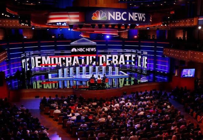 Democratic presidential candidates listen to a question during the Democratic primary debate hosted by NBC News at the Adrienne Arsht Center for the Performing Art, Wednesday, June 26, 2019, in Miami.