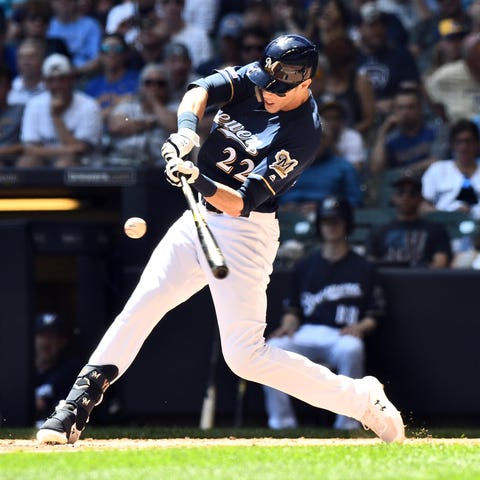 Brewers star Christian Yelich cracks one of his...