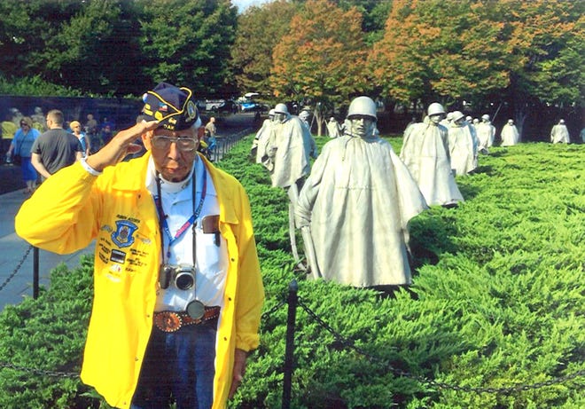 Airman Ruben Acosta saluted at the Korean War Memorial in Washington DC during his Honor Flight trip last year. Acosta will lead the city's Fourth of July parade as grand marshal.