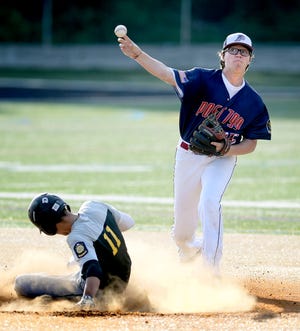 Pleasureville's Connor Richeson forces Red Lion's Brandon Ritchey and throws to complete the double play during American Legion baseball at Red Lion Wednesday, June 26, 2019. Bill Kalina photo