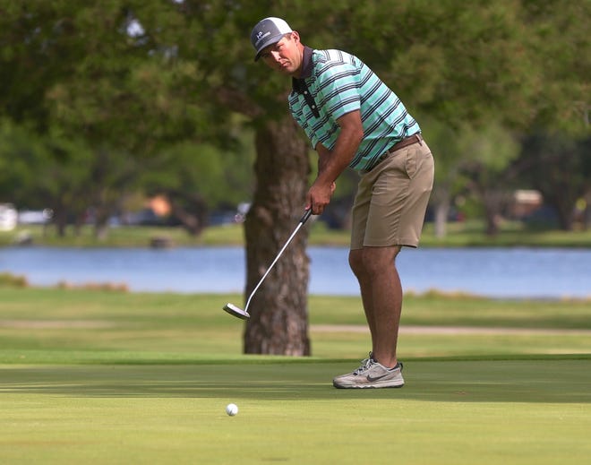 Word Hudson watches as his ball nears the cup during the opening round of the San Angelo Country Club Men's Partnership on Thursday, June 27, 2019.