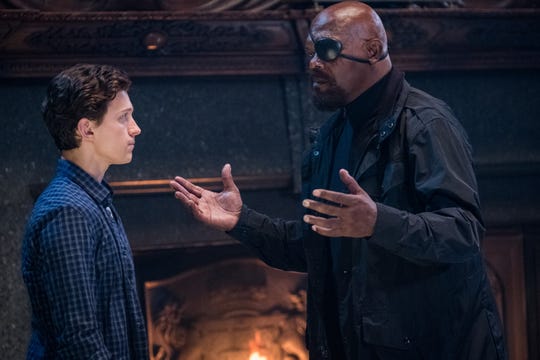 Nick Fury (Samuel L. Jackson, right) doesn't love having to team up with Peter Parker (Tom Holland) in "Spider-Man: Far From Home."