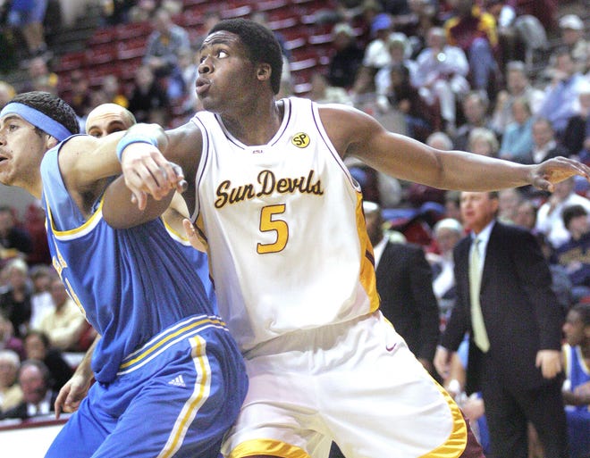 ASU's Ike Diogu tries muscle free of UCLA center Lorenzo Mata during a game Jan. 13, 2005 at Wells Fargo Arena.