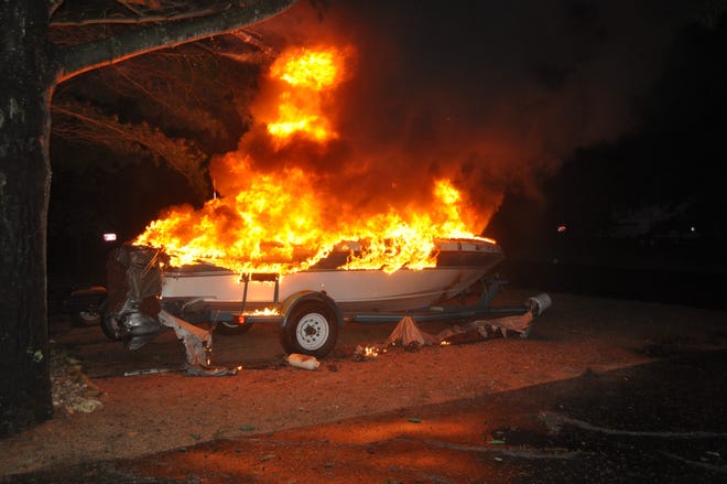 Lightning started a fire that destroyed a boat in the Adams County town of Rome early Friday.