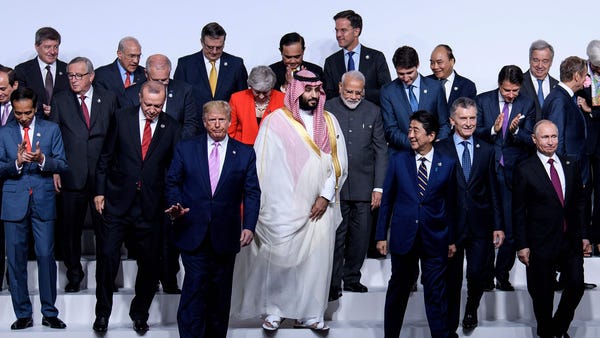 Leaders leave after a group photo.