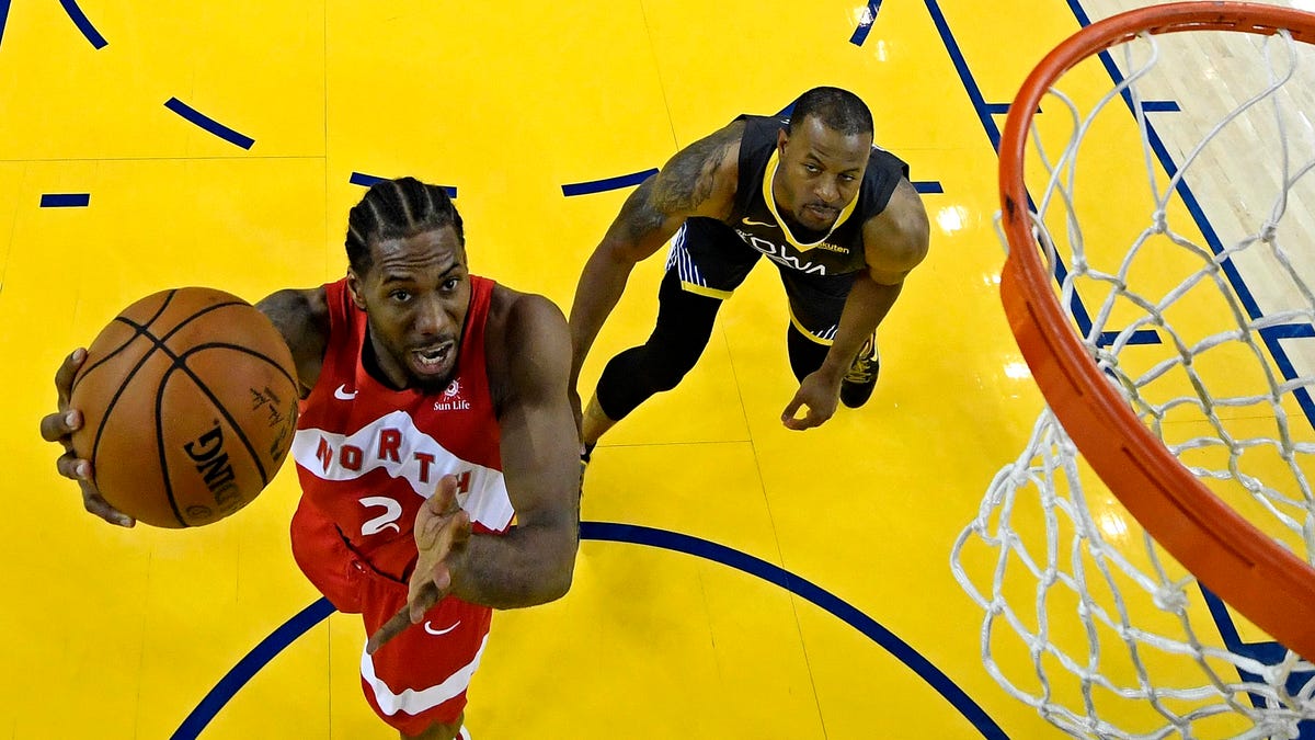 Raptors forward Kawhi Leonard (2) shoots the ball against Warriors guard Andre Iguodala (9) in Game 6 of the NBA Finals.