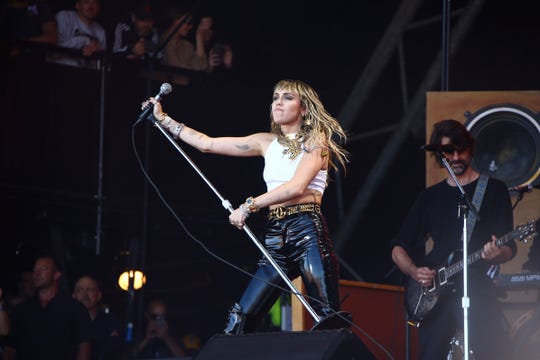 Miley Cyrus performs on the last day of the Glastonbury Festival at Worthy Farm in Somerset, England.