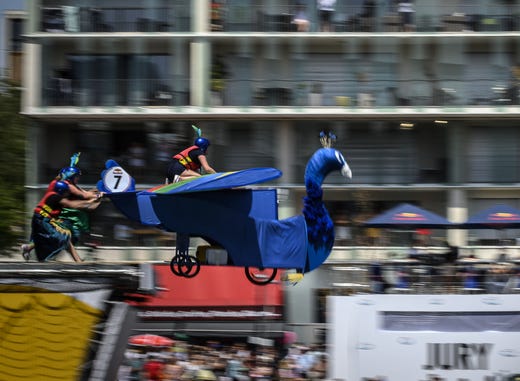 Competitors take part in a competition of outlandish flying machines during the Red Bull Flight Day in Lyon, France. 