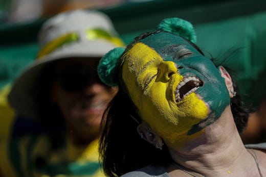 Government supporters participate in a rally to demonstrate citizen support for the government of Brazilian President Jair Bolsonaro and Brazilian Minister of Justice Sergio Moro at the Orla de Copacabana, in Rio de Janeiro, Brazil. T