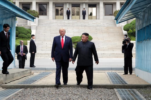 North Korean leader Kim Jong Un and President Donald Trump inside the demilitarized zone (DMZ) separating the South and North Korea on June 30, 2019 in Panmunjom, South Korea.