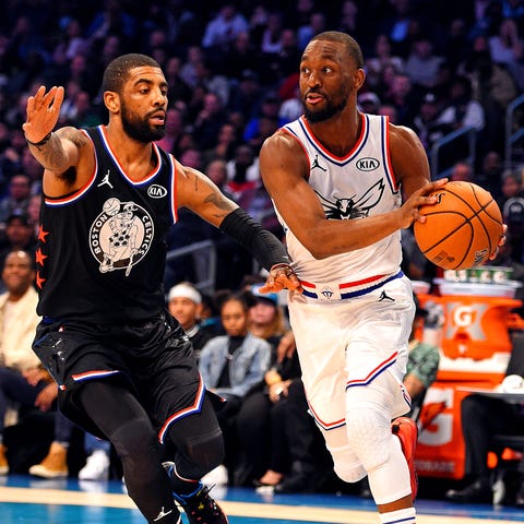 Kemba Walker and Kyrie Irving during the All-Star...