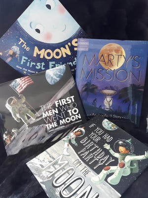 Selected books about the moon for young readers.