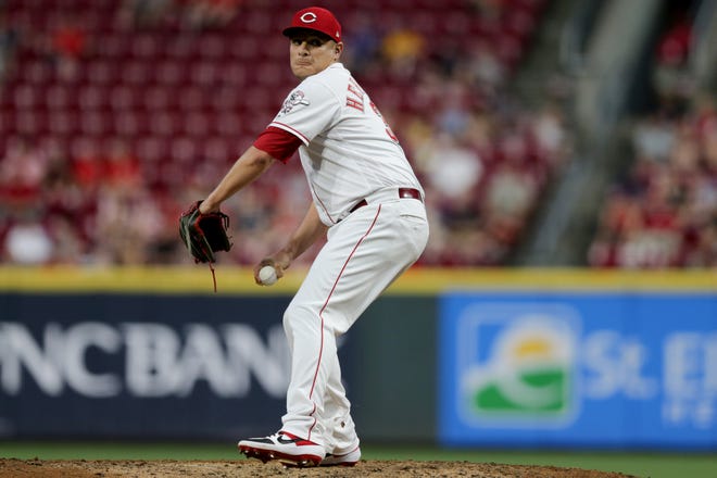 Cincinnati Reds relief pitcher David Hernandez (37) delivers in the seventh inning of an MLB baseball game against the Milwaukee Brewers, Monday, July 1, 2019, at Great American Ball Park in Cincinnati. The Milwaukee Brewers won 8-6. 