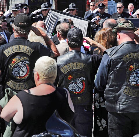 Members of the Jarheads Motorcycle Club and a...