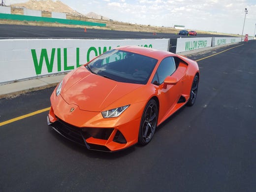 The 2020 Lamborghini Huracan EVO uses aero tricks — side curtain airflow through the front wheel wells, a front splitter — to help suck the 3,500-pound beast to the asphalt at high speed.