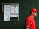 UL Coach Tony Robichaux watches the action from the dugout at UL plays San Diego State in the NCAA Baseball Division I Regional Tournament Saturday, May 31, 2014, at M.L. "Tigue" Moore Field in Lafayette.