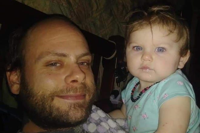 Raymond Michiel, left, holds his daughter Jazmin Michiel. Father and daughter died June 25 in a house fire in Pickerel, Wisconsin.