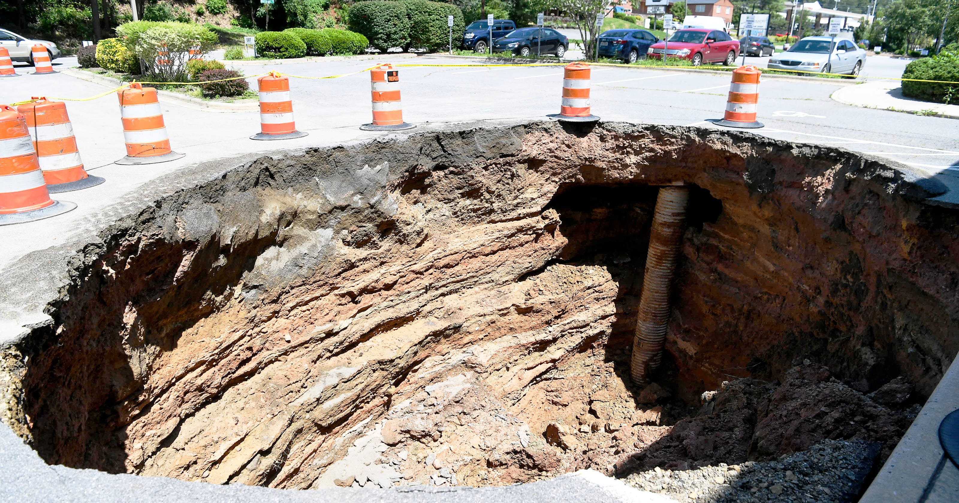 Tons Of Dirt From Merrimon Avenue Sinkhole Pour Into