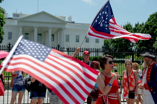 Trump supporters rally in front of the White House on July 3, 2019. Trump supporters and oppositions made speeches for and against Trump in front of the White House at the same time in the afternoon.