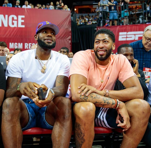 LeBron James and Anthony Davis in attendance for...