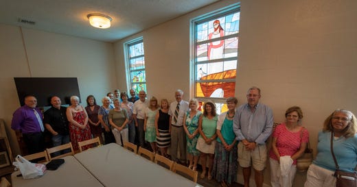 This is the crew of stained glass creators who made the most recent windows at Salem United Church of Christ in Jacobus.