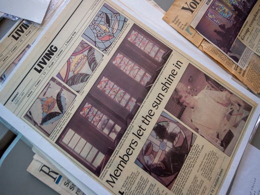 A York Daily Record newspaper clipping from 1993 talks about installing the first windows in the sanctuary.