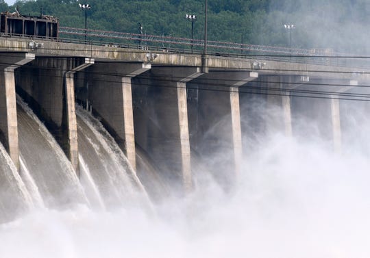Water flows through Conowingo Dam, a hydroelectric dam spanning the lower Susquehanna River near Conowingo, Md., on Thursday, May 16, 2019. Officials once counted on the dam to block large amounts of sediment in the Susquehanna from reaching Chesapeake Bay, the nation's largest estuary, but the reservoir behind the dam has filled with sediment far sooner than expected.