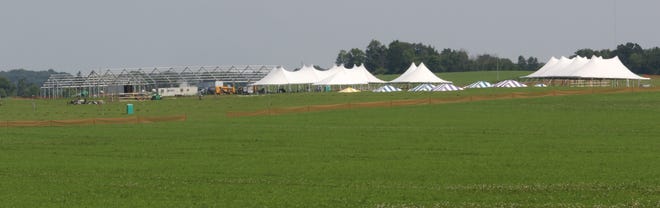 Tent city begins to take shape on June 7 at the Walter Grain Farms in Johson Creek for the Jefferson County Farm Technology Days.