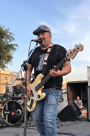 Orlando Estrada plays for 360, an Abilene-based rock band that performed in June at Party on the Patio.