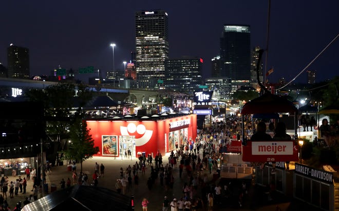 People attend the last night of Summerfest in Milwaukee on July 7, 2019.