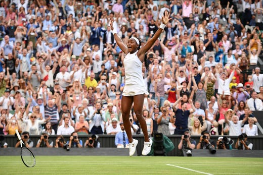 15-year-old U.S. player Cori Gauff celebrates beating Slovenia's Polona Hercog during their women's singles third round match on the fifth day of the 2019 Wimbledon Championships at The All England Lawn Tennis Club in Wimbledon on July 5, 2019.