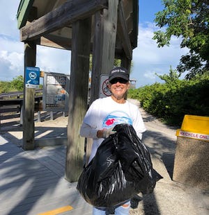  Perennial volunteer Donna Kaczka returns with 20 lbs. of debri.