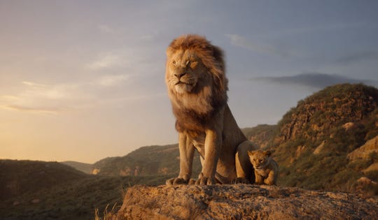 Mufasa (voiced by James Earl Jones, left) shows young Simba (JD McCrary) the land he will rule some day in 'The Lion King.'
