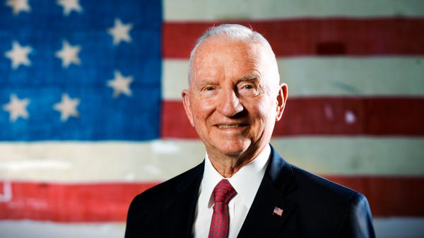 Former Presidential candidate Ross Perot stands...