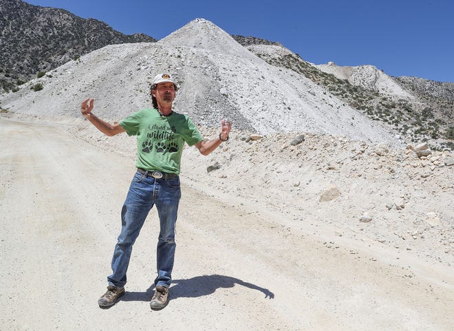 Biologist Tom Egan talks about the White Knob Mine in Lucerne Valley, Calif., on June 19, 2019.