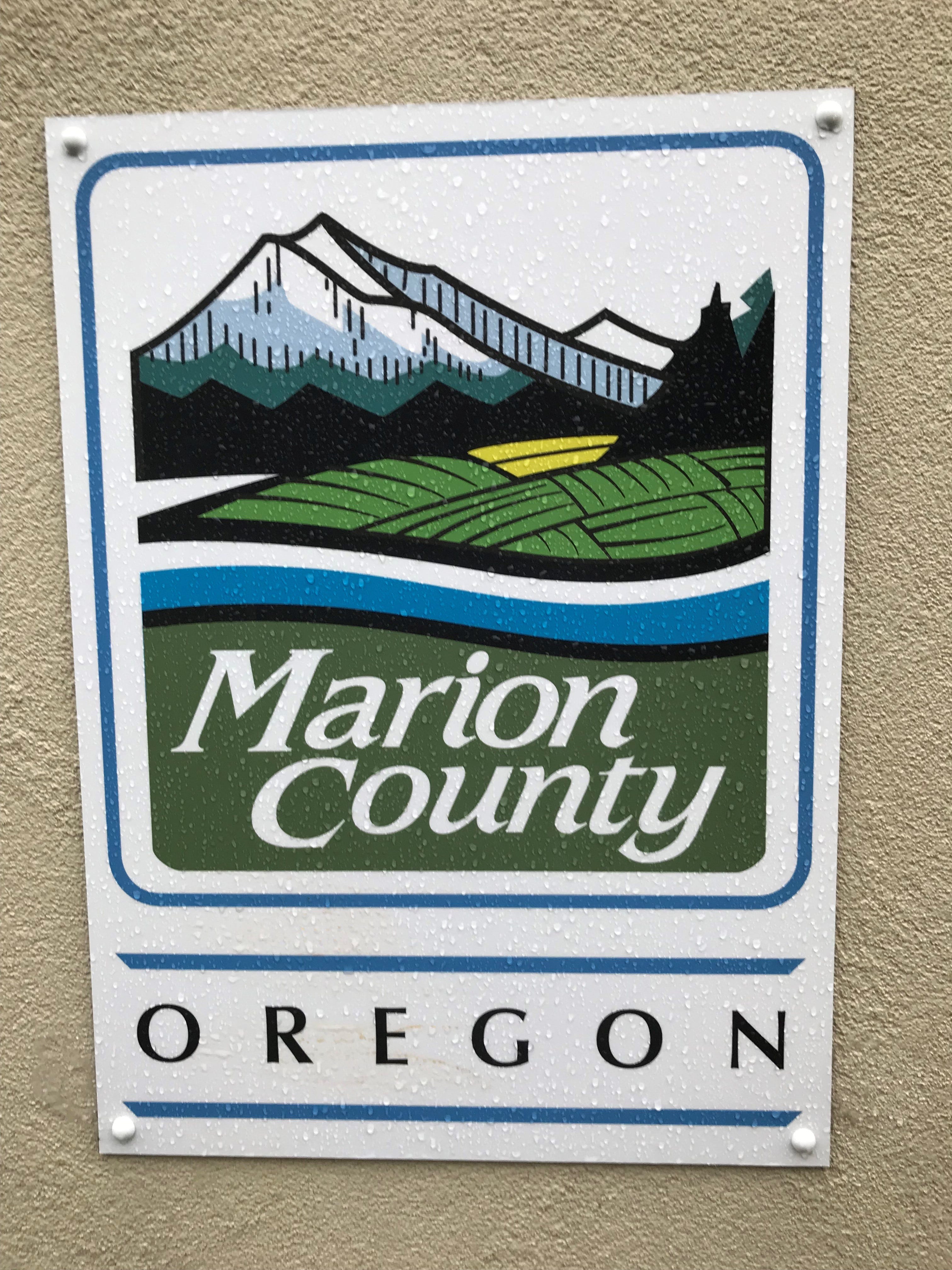 The Marion County logo outside the Health and Human Services building on Silverton Road in Salem.