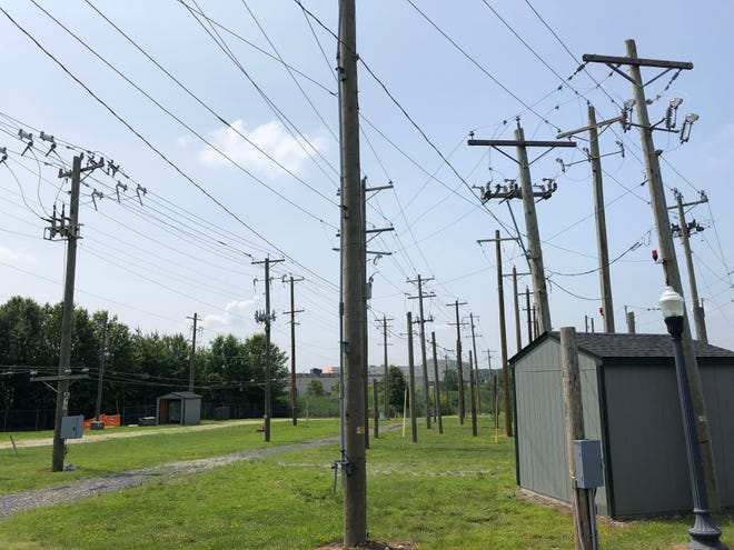 Lineworker candidates spend almost five years training before they are deployed in the field. This is part of the training ground at their New Castle County office.