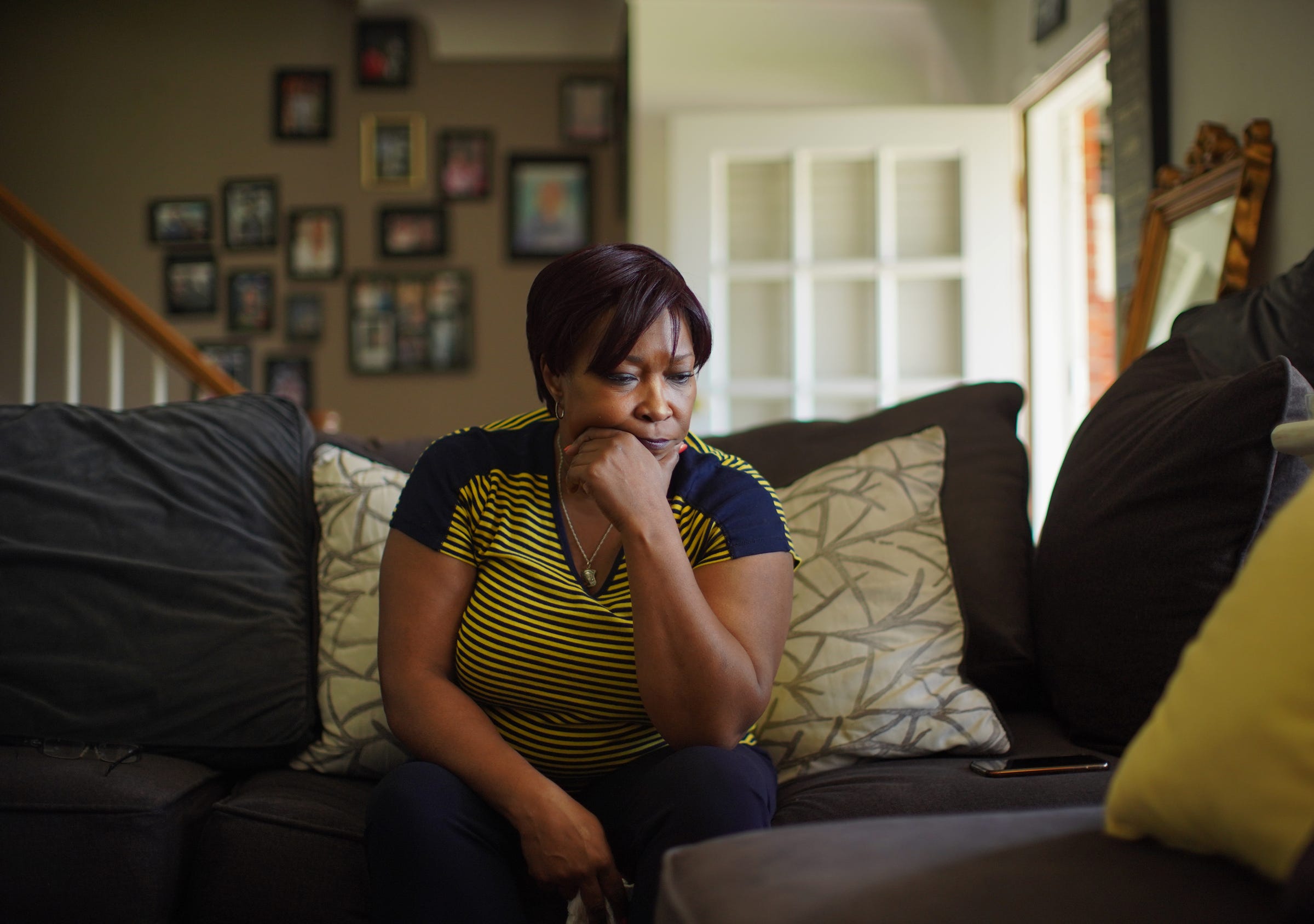 Ethel "Marie" Lyons talks her son James Clay, who is in prison for a 1997 sexual assault he maintains he did not commit, at her home in Roseville on Friday, June 7, 2019. A Wayne County jury convicted Clay in 2017 and he is serving a 25-50 years sentence. Lyons hired a private investigator to look into the case.