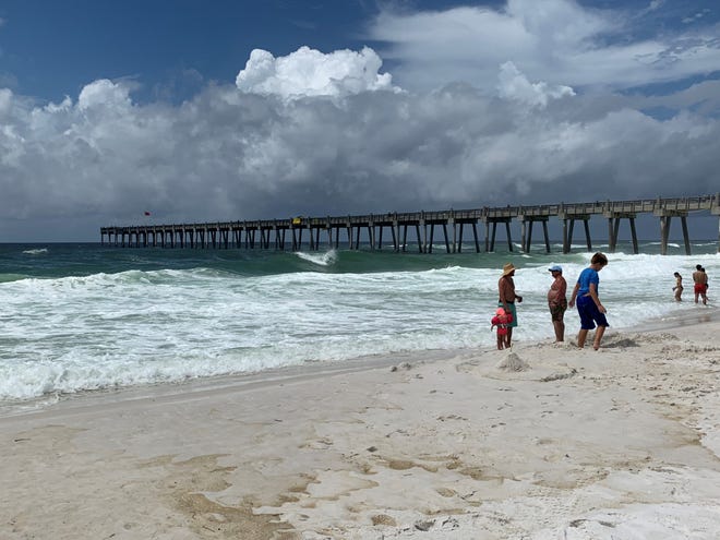 Crowds start to gather Thursday, July 11, 2019, at Pensacola Beach before the Blue Angels Air Show.