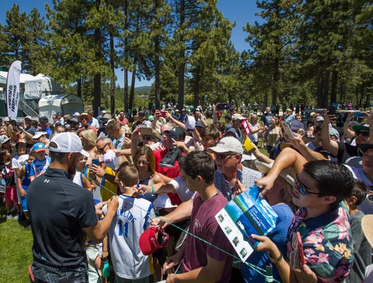 Steph Curry with fans during the American Century Championship at Edgewood Tahoe Golf Course on Thursday.
