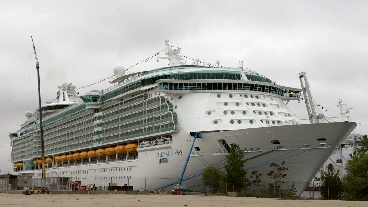 This May 11, 2006, file photo shows the Freedom of the Seas cruise ship docked in Bayonne, New Jersey. Police in Puerto Rico say that on Sunday, July 7, 2019, a toddler apparently slipped from her grandfather's hands and fell to her death on this cruise ship, Freedom of the Seas, while docked in Puerto Rico.