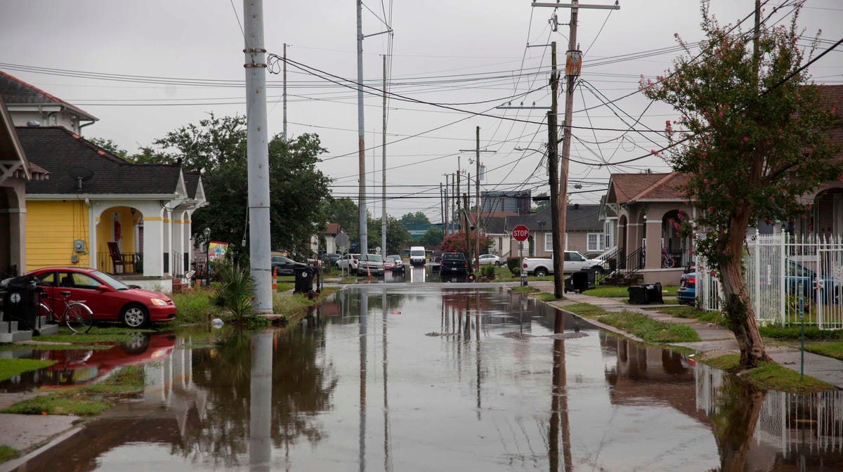 S Telemachus Street in New Orleans is flooded after flash floods struck the area early on July 10, 2019. - The US city of New Orleans was under a storm-surge watch on July 10 along with a stretch of Louisiana coast as a tropical storm formed in the Gulf of Mexico, threatening the region with potentially life-threatening rains. (Photo by Seth HERALD / AFP)SETH HERALD/AFP/Getty Images ORG XMIT: New Orlea ORIG FILE ID: AFP_1IL3KO