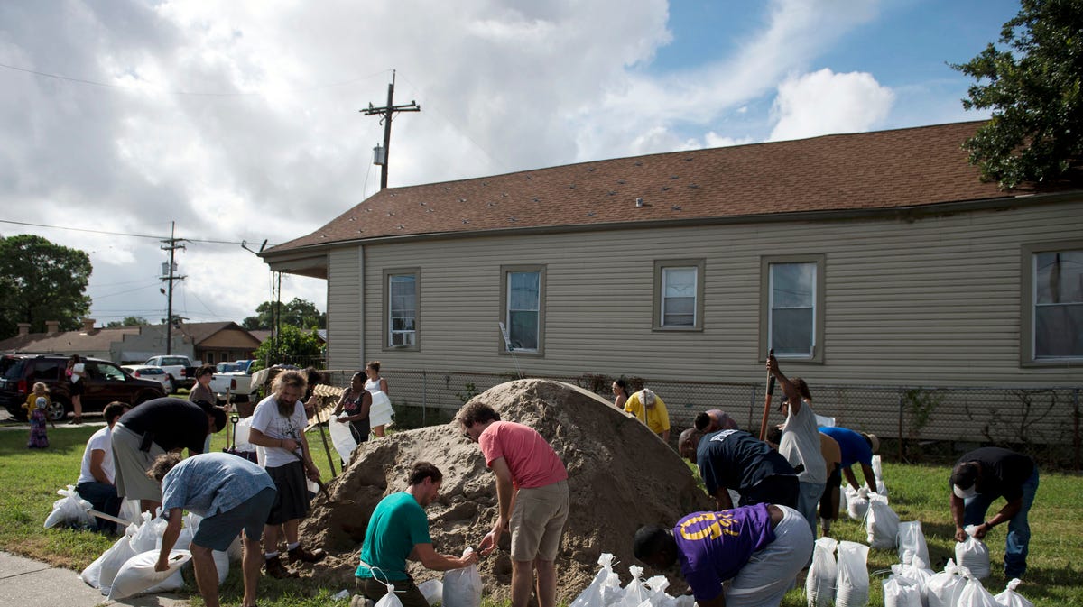 Residents fill sandbags in the St. Roch neighborhood of New Orleans on July 11, 2019. 