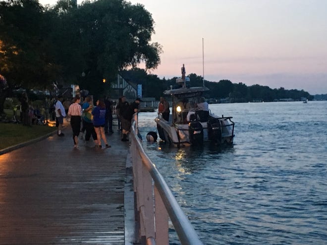 Rescue crews respond to the St. Clair boardwalk Friday evening.