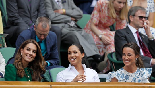 Kate, the Duchess of Cambridge, Meghan, the Duchess of Sussex and Pippa Matthews, from left to right, seated in the Royal Box on Center Court to watch the women's singles final at Wimbledon in London on July 13, 2019. "width =" 540 "data-mycapture-src =" "data-mycapture-sm-src ="
